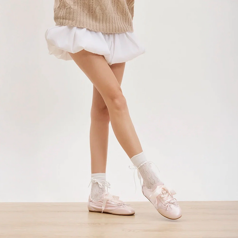 Coquette Classics: The Softer Side of Sneakers